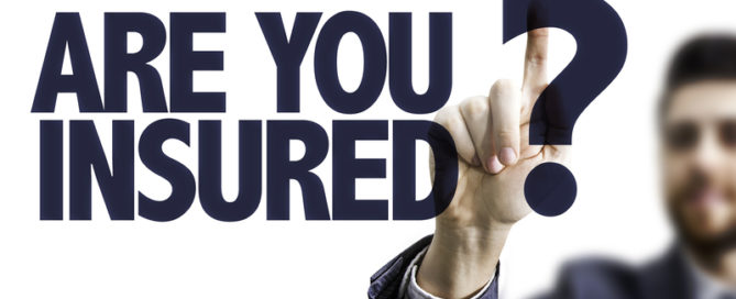 Business man pointing the text: Are You Insured?